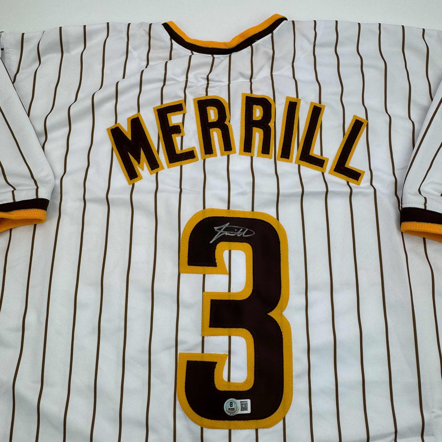 Autographed/Signed Jackson Merrill San Diego Pinstripe Baseball Jersey Beckett BAS COA