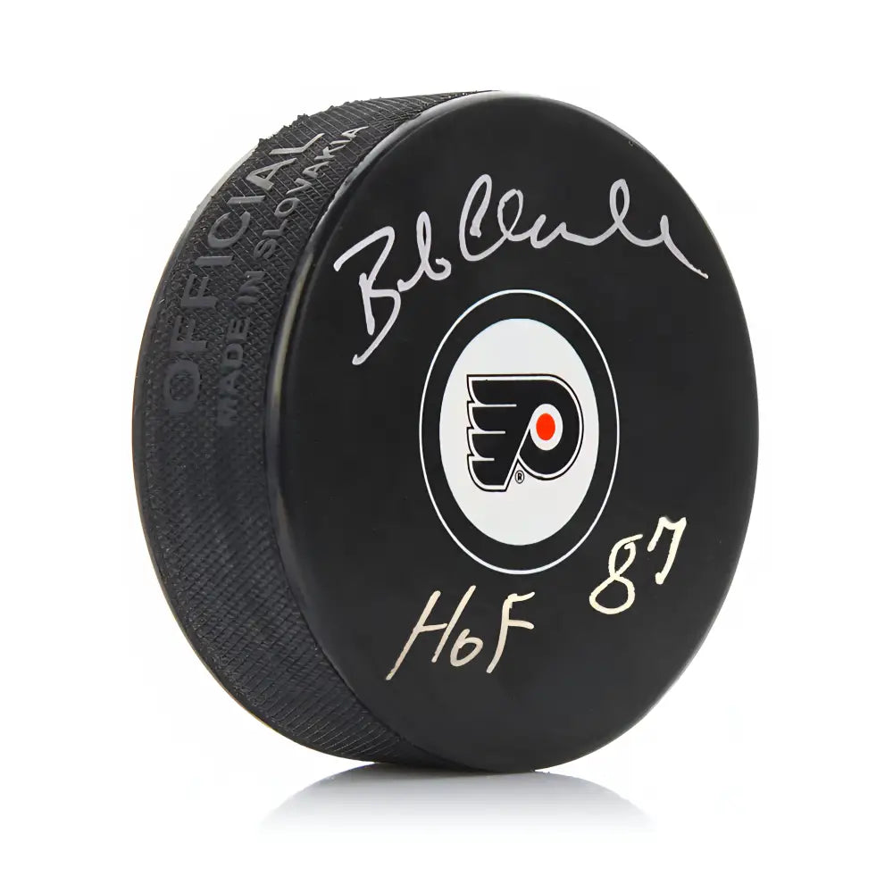 Bob Clarke Autographed Philadelphia Flyers Hockey Logo Puck with Hall of Fame Inscription - Hockey Memorabilia