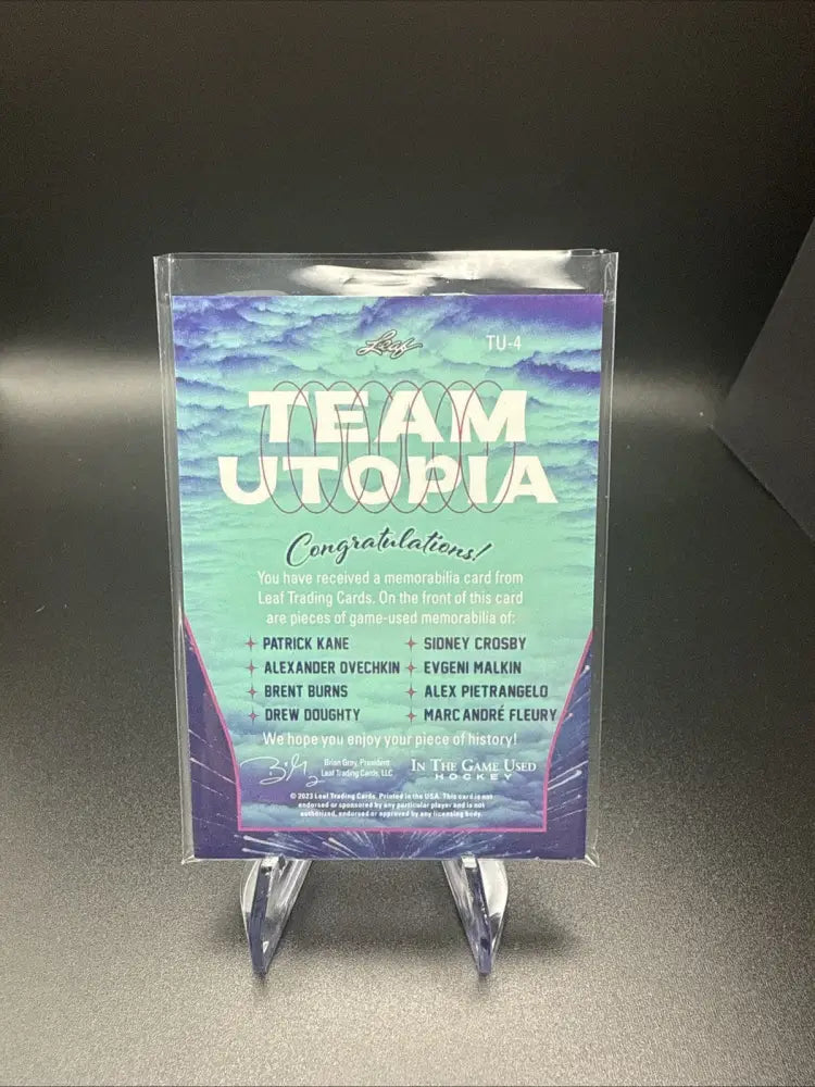 2023 Leaf In The Game Used Hockey Team Utopia Multi-Player Relic Card – #06/15