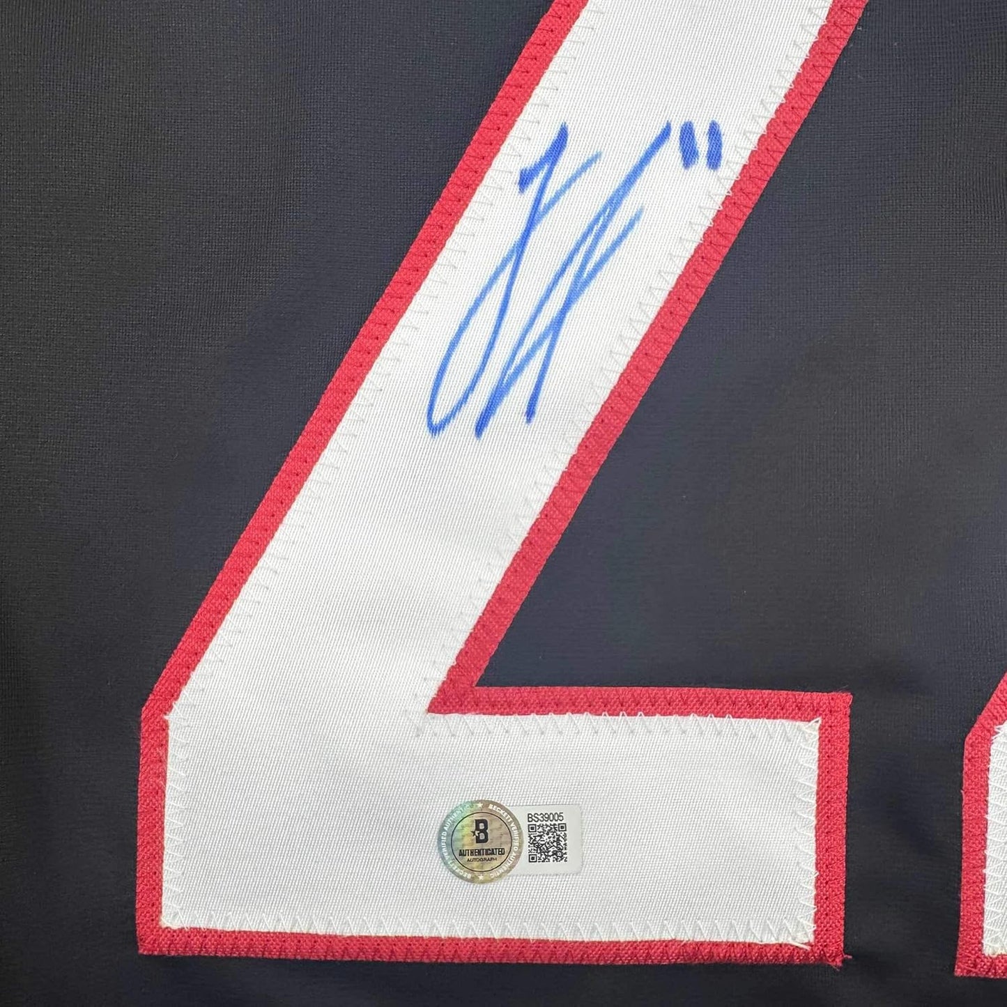Framed Autographed/Signed Logan Stankoven 35x39 Carolina Black Hockey Jersey Beckett BAS COA