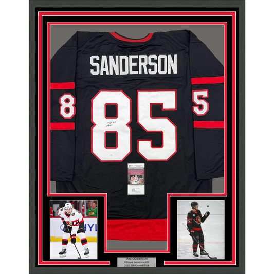 Framed Autographed/Signed Jake Sanderson 35x39 Ottawa Black Hockey Jersey JSA COA
